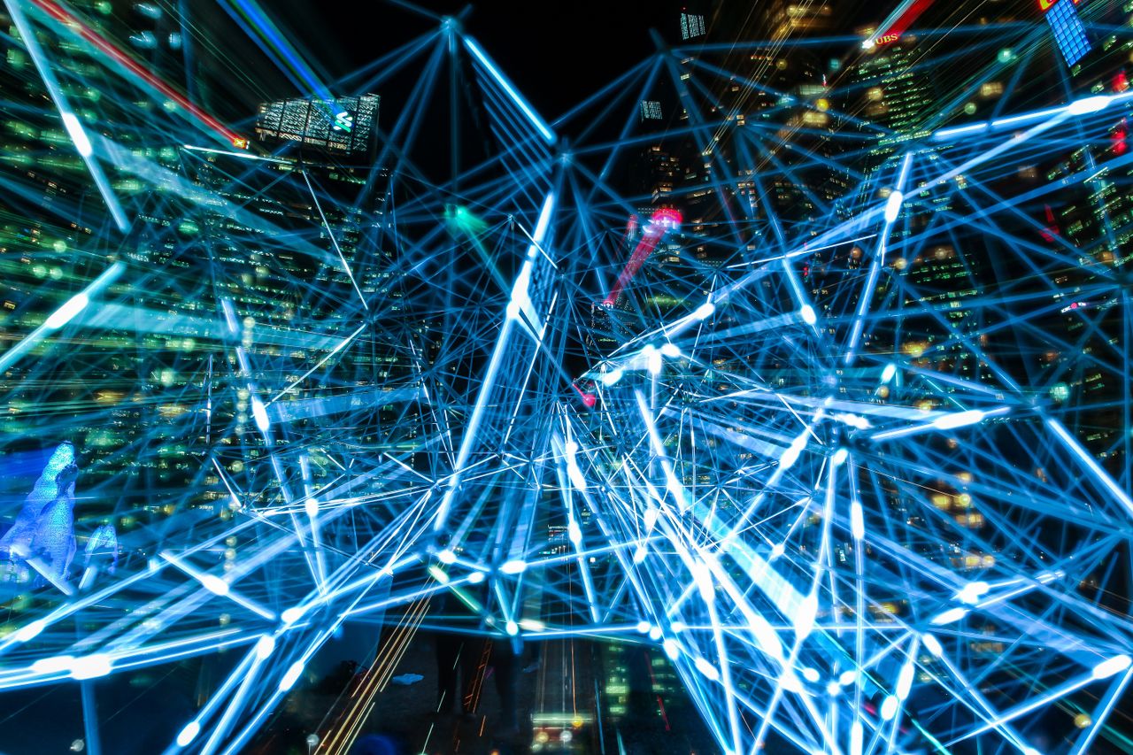 Crafting Captivating Headlines: Your awesome post title goes here Dynamic urban scene showcasing interconnected light trails representing digital communication networks.